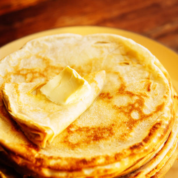 istock Stack of Russian-style pancakes with raspberries 912236254