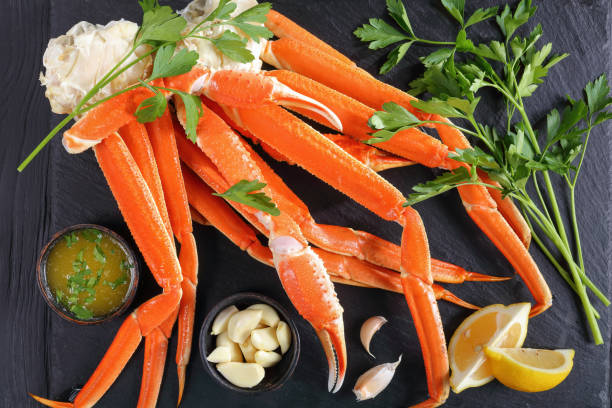 istock Crab legs with melted butter, close-up 912244420