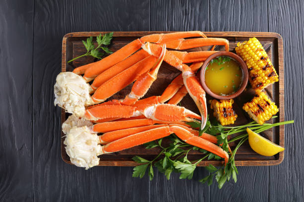 istock close-up of Crab legs and corn cobs 912244596