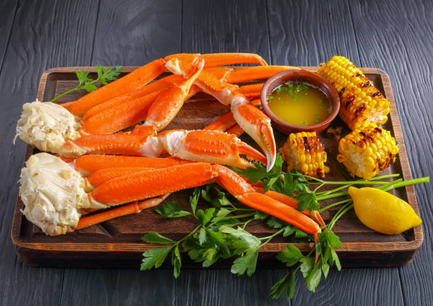 istock close-up of Crab legs and corn in cobs 912244678