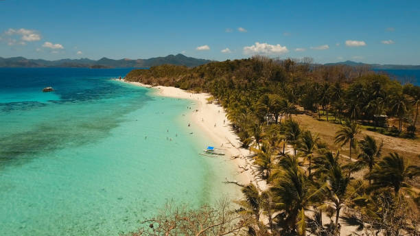 istock Aerial view beautiful beach on a tropical island Malcapuya. Philippines 912244822