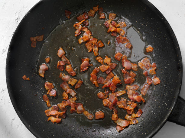 istock Chopped Bacon in a Frying Pan 912244866