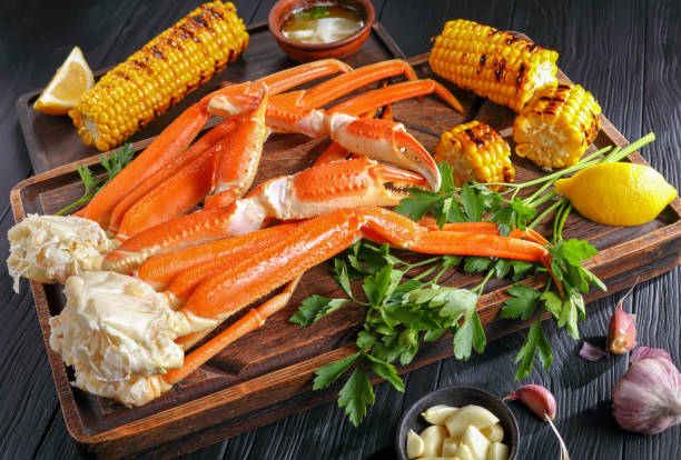 istock Crab legs served with melted butter 912244980