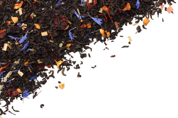 istock Aromatic black dry tea with petals isolated on white background top view 912245344