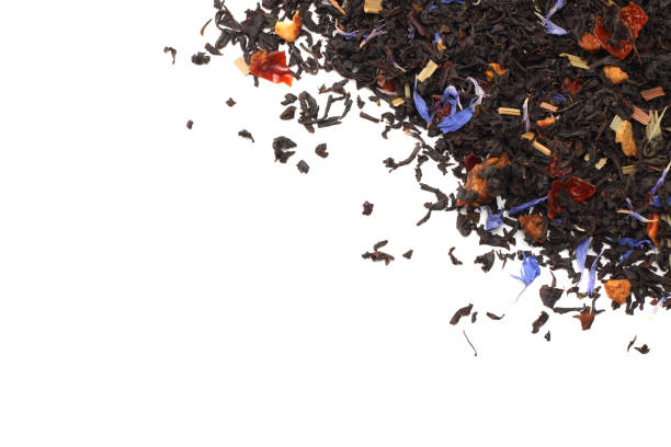 istock Aromatic black dry tea with petals isolated on white background top view 912245376