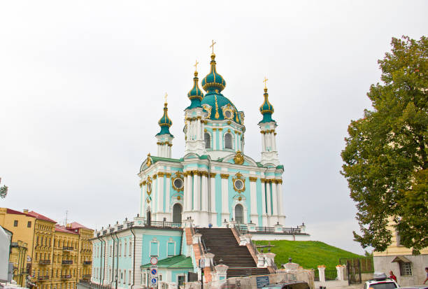 The golden dome of the Orthodox Church against the backdrop of a clear blue sky.