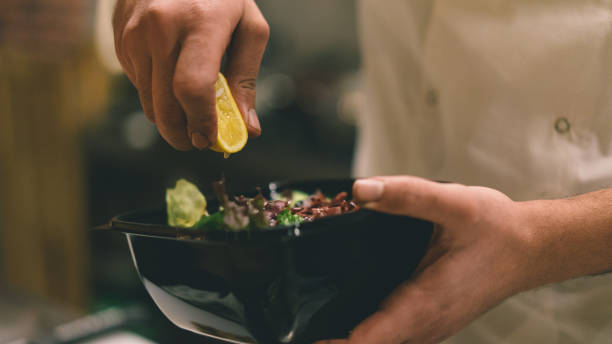 istock Person making a salad with avocado 912248134