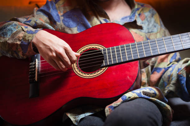 istock Man playing acoustic guitar. 912251496