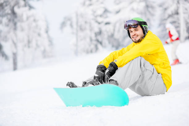 istock Snowboarder resting outdoors 912252198