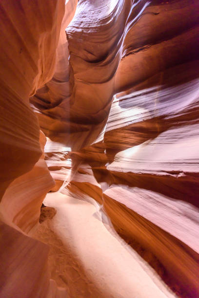 istock Small Path through Upper Antelope Canyon. Natural rock formation in beautiful colors. Beautiful wide angle view of amazing sandstone formations. Near Page at Lake Powell, Arizona, USA 912254444