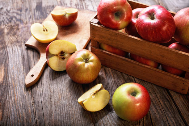 istock ripe red apples on a wooden table 912255258