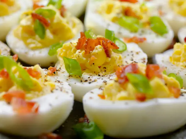 Deviled Eggs with Bacon, Green Onions. Sea Salt and Pepper