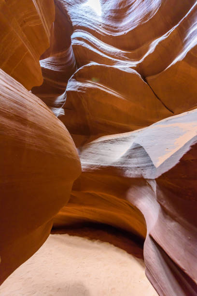 istock Small Path through Upper Antelope Canyon. Natural rock formation in beautiful colors. Beautiful wide angle view of amazing sandstone formations. Near Page at Lake Powell, Arizona, USA 912255452