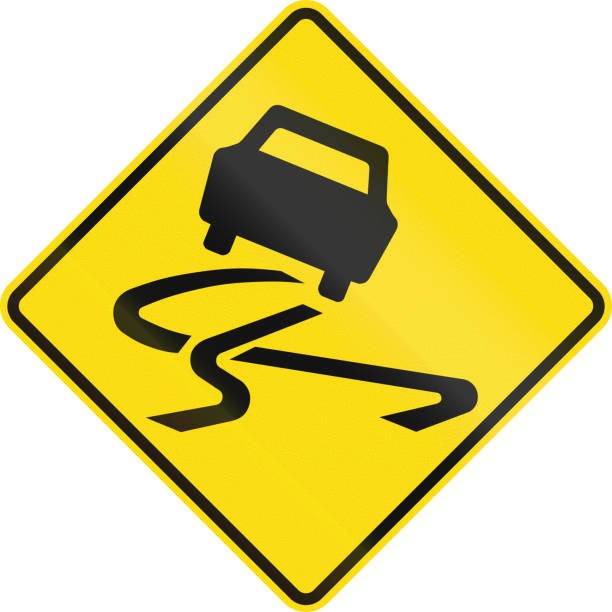 istock New Zealand road sign - Slippery road surface 912255556