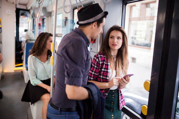 istock Group of young people in a tram or bus 912257106