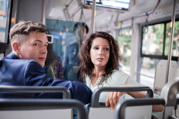 istock Group of young people in a tram or bus 912257244