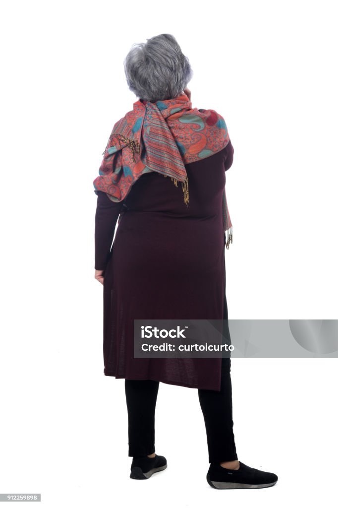portrait of a senior woman portrait of a senir woman of back isolated on white Rear View Stock Photo