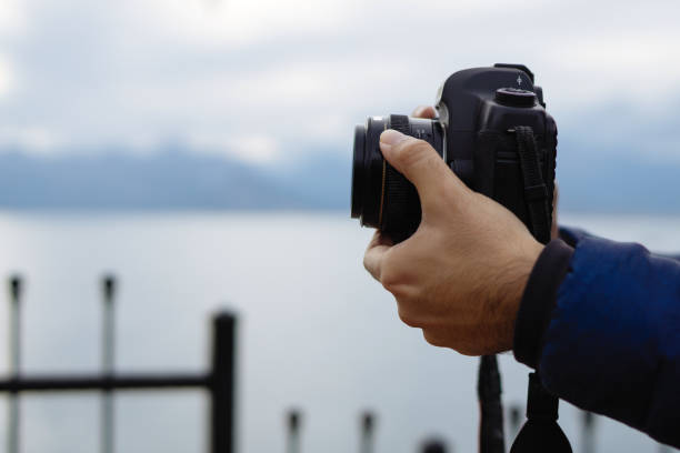 istock Young man photographer shooting on location with backpack 912263712