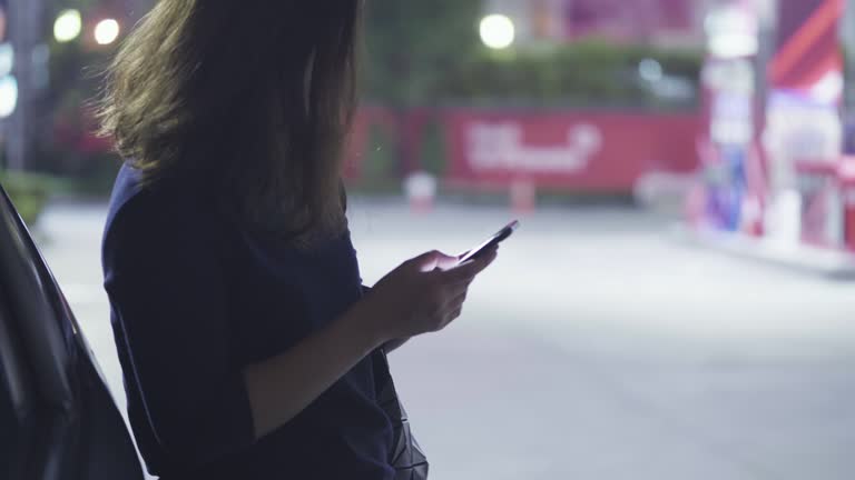 using smartphone at Station pump