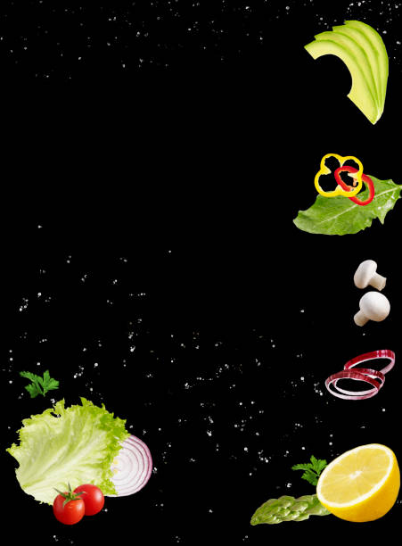 Ingredients Salad Ingredients on green  background arugula falling stock pictures, royalty-free photos & images