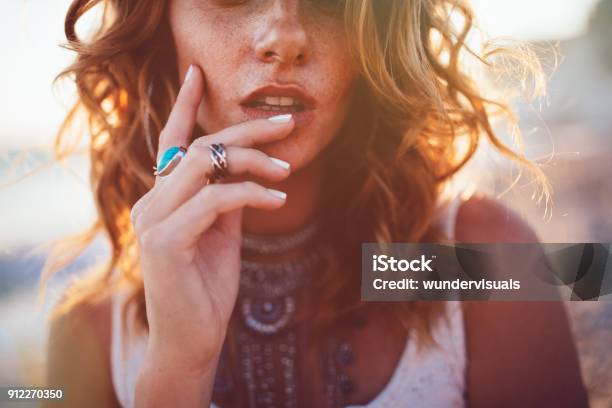 Young Woman Wearing Bohemian Style Silver Jewelry Stock Photo - Download  Image Now - Jewelry, Women, Wavy Hair - iStock