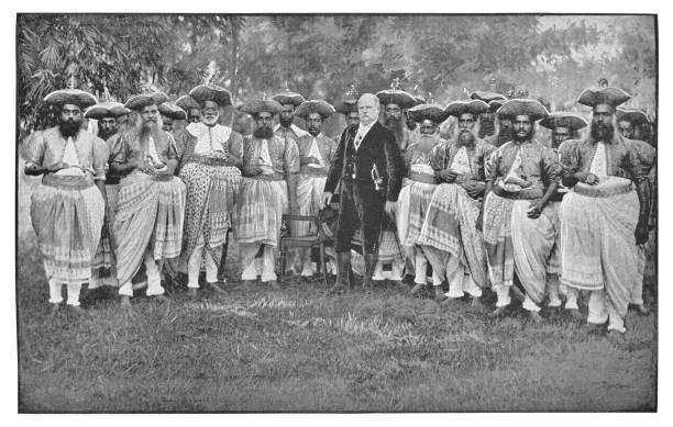 istock British Man with Group of Indian Men in India - British Era 912270776