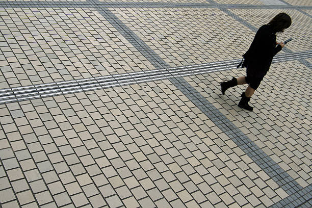 istock Girl walking on the platform with mobile phone 91227097