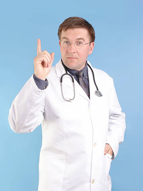 istock Family doctor pointing up 91227114