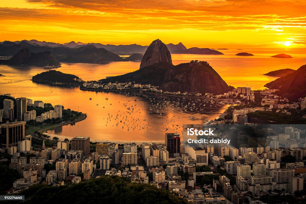 Sunrise in Rio de Janeiro Beautiful Warm Sunrise in Rio de Janeiro With the Sugarloaf Mountain Silhouette. Rio de Janeiro Stock Photo