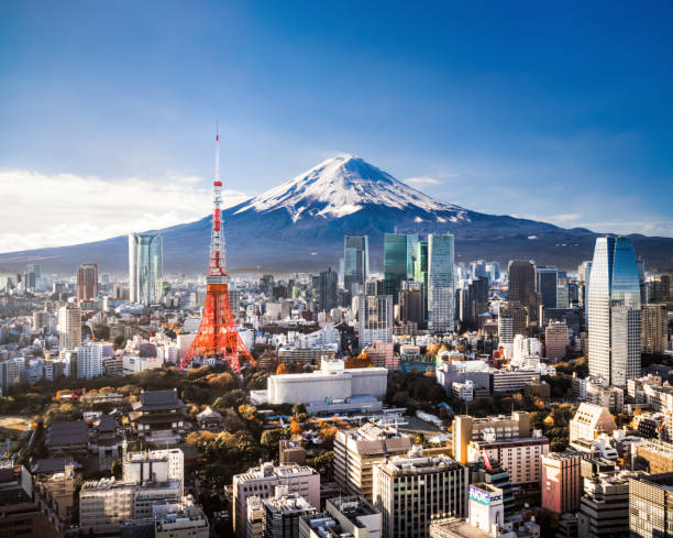 Mt. Fuji and Tokyo Skyline Aerial view of Mt. Fuji, Tokyo Tower and modern skyscrapers in Tokyo on a sunny day. mt. fuji photos stock pictures, royalty-free photos & images