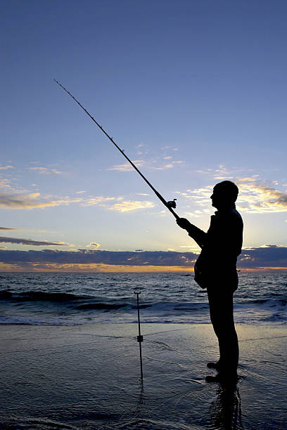 istock Surf Fisherman waits for a Bite 91228106
