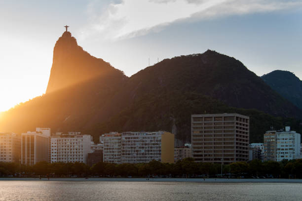 Corcovado Mountain in Rio de Janeiro Corcovado Mountain by Sunset View, with Buildings of Botafogo District Below corcovado stock pictures, royalty-free photos & images