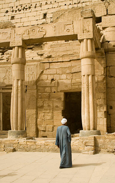 istock Egyptian man in front of Luxor Temple Egypt 91228326