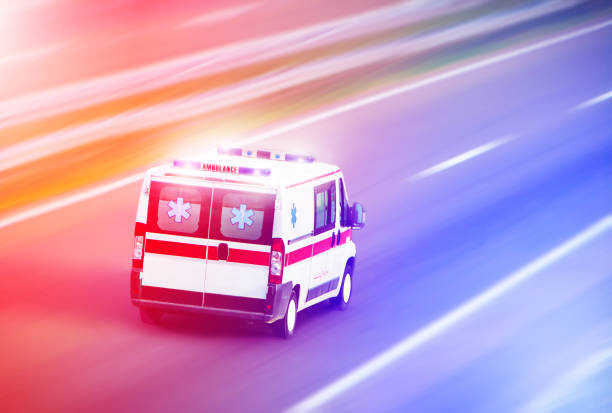 Ambulance van on highway, emergency stock photo