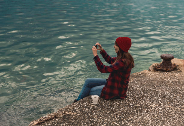istock Woman taking pictures with a cellphone 912290438