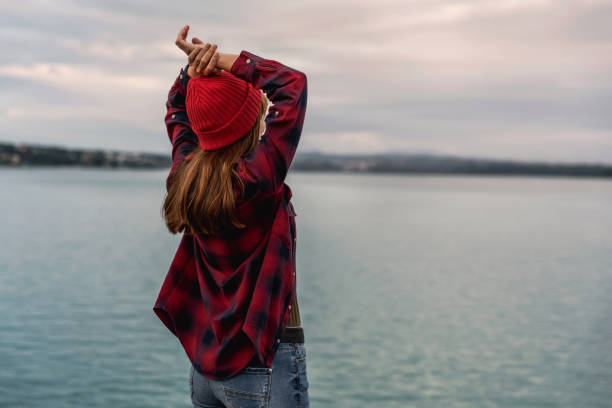 istock Girl on the lake 912290450