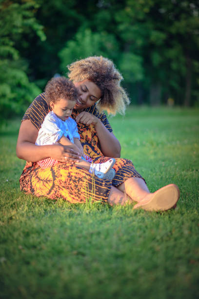 istock Mother and her daughter having fun in the park 912290998