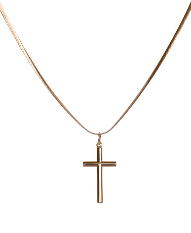 The Christian cross and gold chain isolated on a white background.