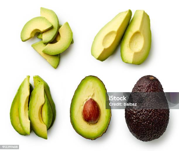 Whole And Sliced Avocado Stock Photo - Download Image Now - Avocado, Slice of Food, Cut Out