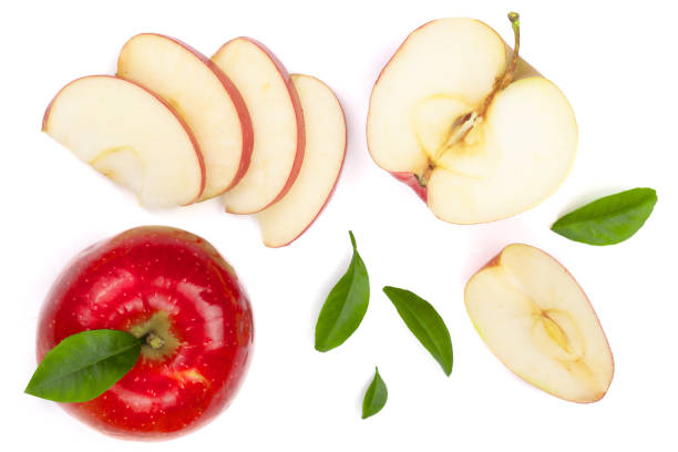 istock red apples with slices and leaves isolated on white background top view. Set or collection. Flat lay pattern 912291548