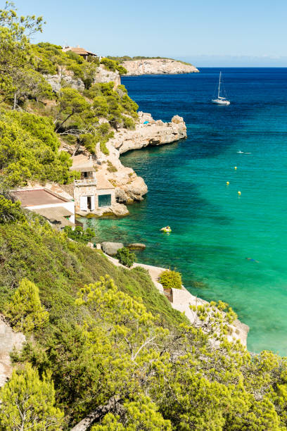 istock Cala Llombards. Beautiful beach that is sheltered on either side by cliffs. Mallorca island, Spain. 912291786