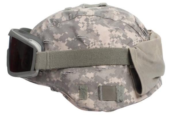 istock kevlar helmet with camouflage cover and protective goggles 912294880