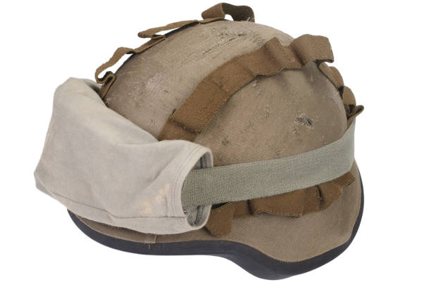 istock kevlar helmet with camouflage cover and protective goggles 912295068