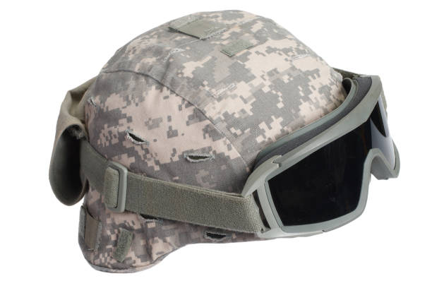 istock kevlar helmet with camouflage cover and protective goggles 912295154