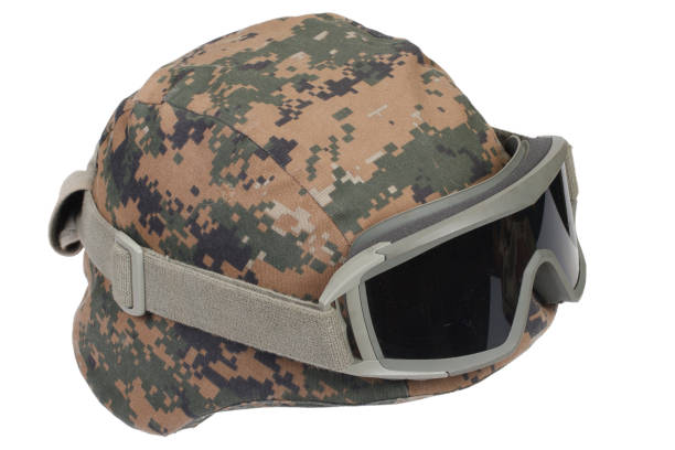 istock kevlar helmet with camouflage cover and protective goggles 912295182