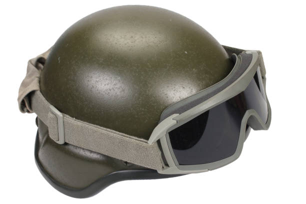 istock kevlar helmet with camouflage cover and protective goggles 912295290