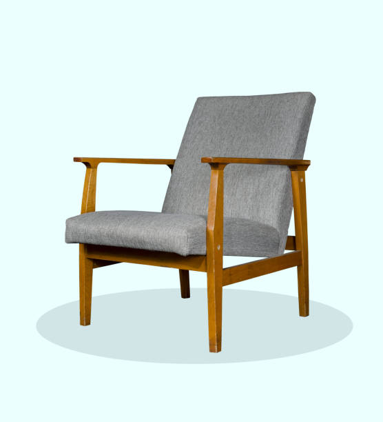 istock An old armchair with gray cover 912295434