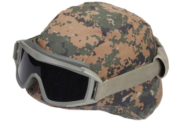 istock kevlar helmet with camouflage cover and protective goggles 912295672