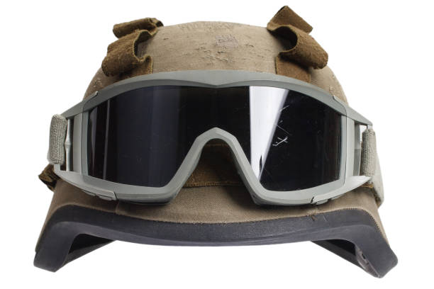 istock kevlar helmet with camouflage cover and protective goggles 912295714