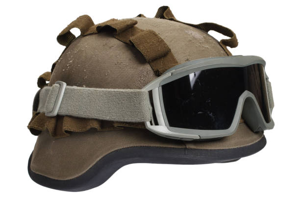 istock kevlar helmet with camouflage cover and protective goggles 912295814